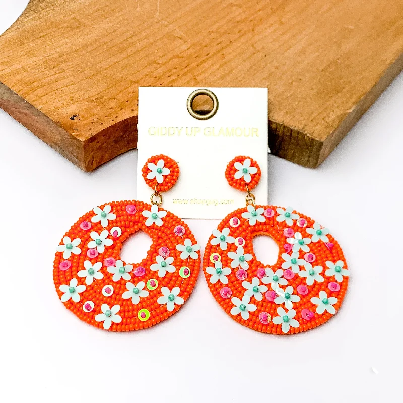 Women’s luxury gold earrings-Orange Beaded Circular Drop Earrings with Floral Designs