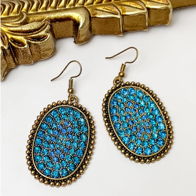 Women’s hoop gold earrings-Oval Jeweled Earrings with Gold Tone Border in Blue