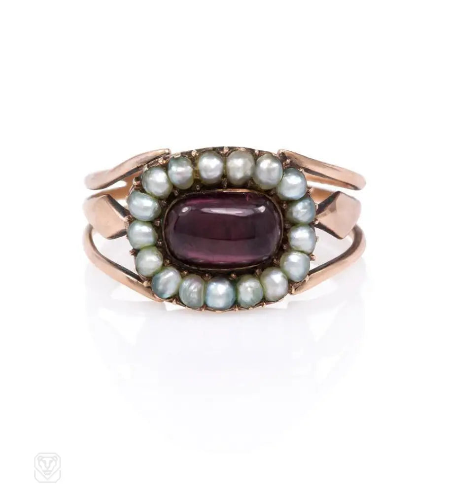 Women’s simple rings-An antique half pearl and garnet cluster ring, in 18k.