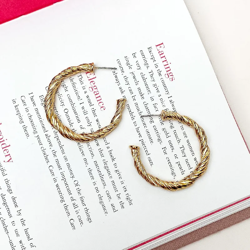 Women’s personalized gold earrings-Anything Goes Twisted Medium Hoop Earrings in Gold Tone