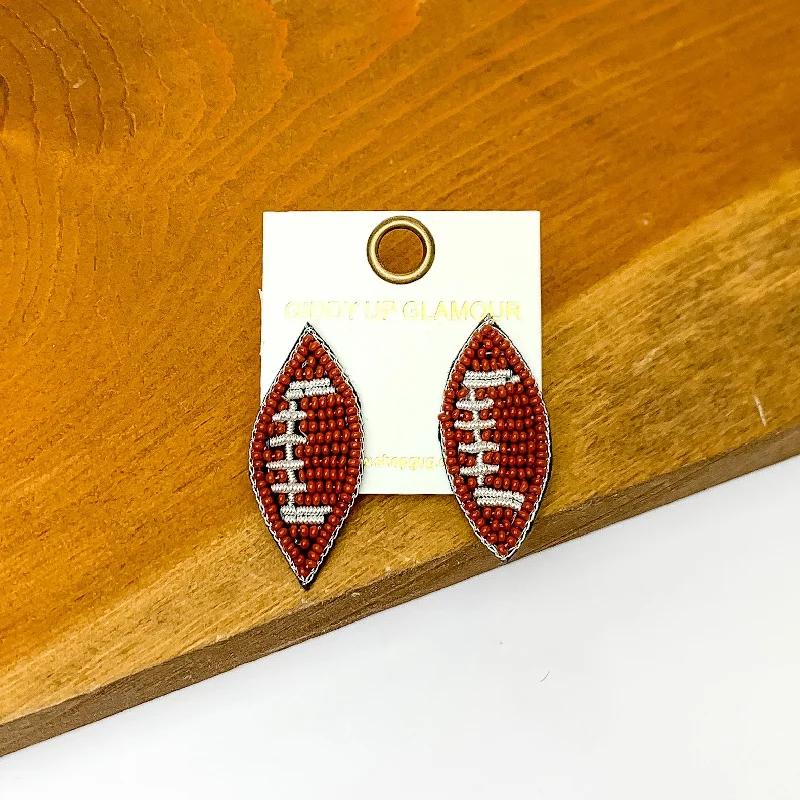 Women’s gemstone stud earrings-Let's Get Sporty Seed Bead Football Stud Earrings