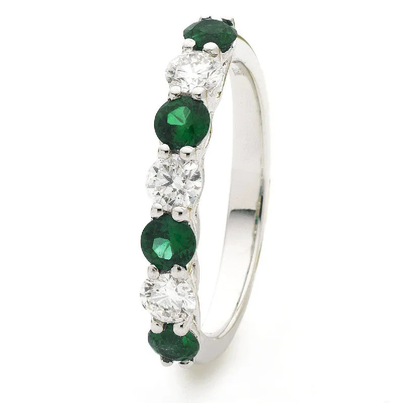 Women’s fancy rings-Emerald and Diamond Seven Stone Ring in Claw Setting