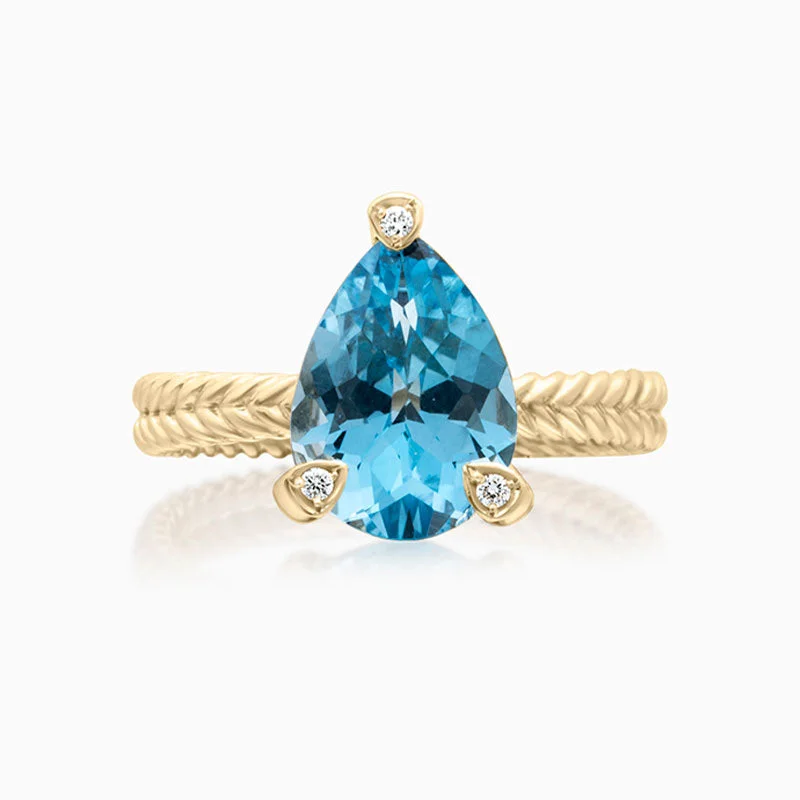 Women’s minimalist rings-Blue Topaz Ring with Braided Gold Band