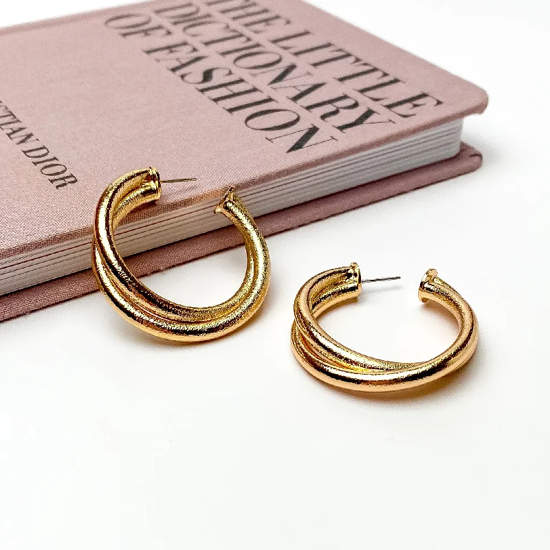 Women’s luxury stud earrings-Twisted Hoop Earrings in Textured Gold Tone