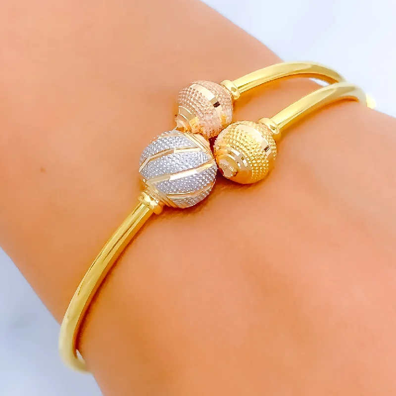 Women’s luxury bracelets-Women’s luxury bracelets-Graceful Striped Orb 22k Gold Bangle Bracelet