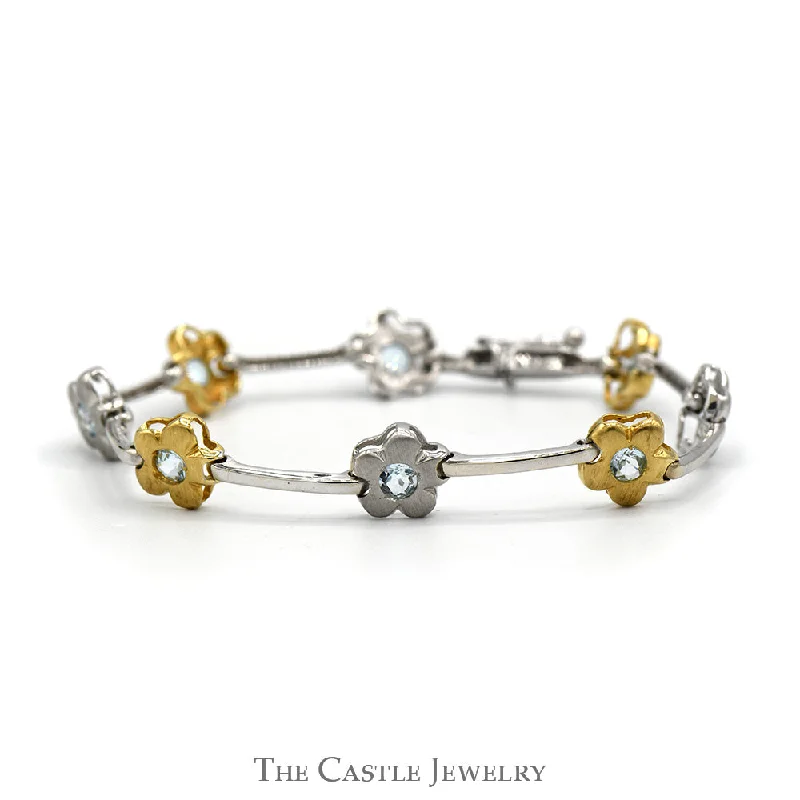 Women’s charm bracelets-Women’s charm bracelets-7 1/4 Inch Two Tone Flower Bar Link Bracelet with Blue Topaz Accents in 14k White & Yellow Gold