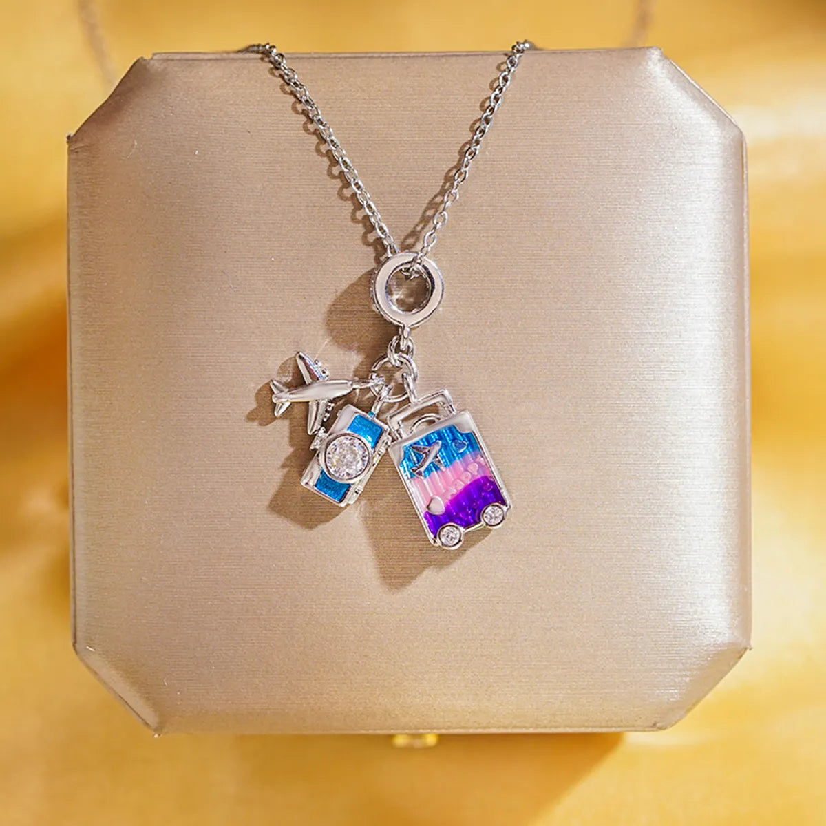 Silver Rainbow Travel Necklace (Camera Luggage Plane)