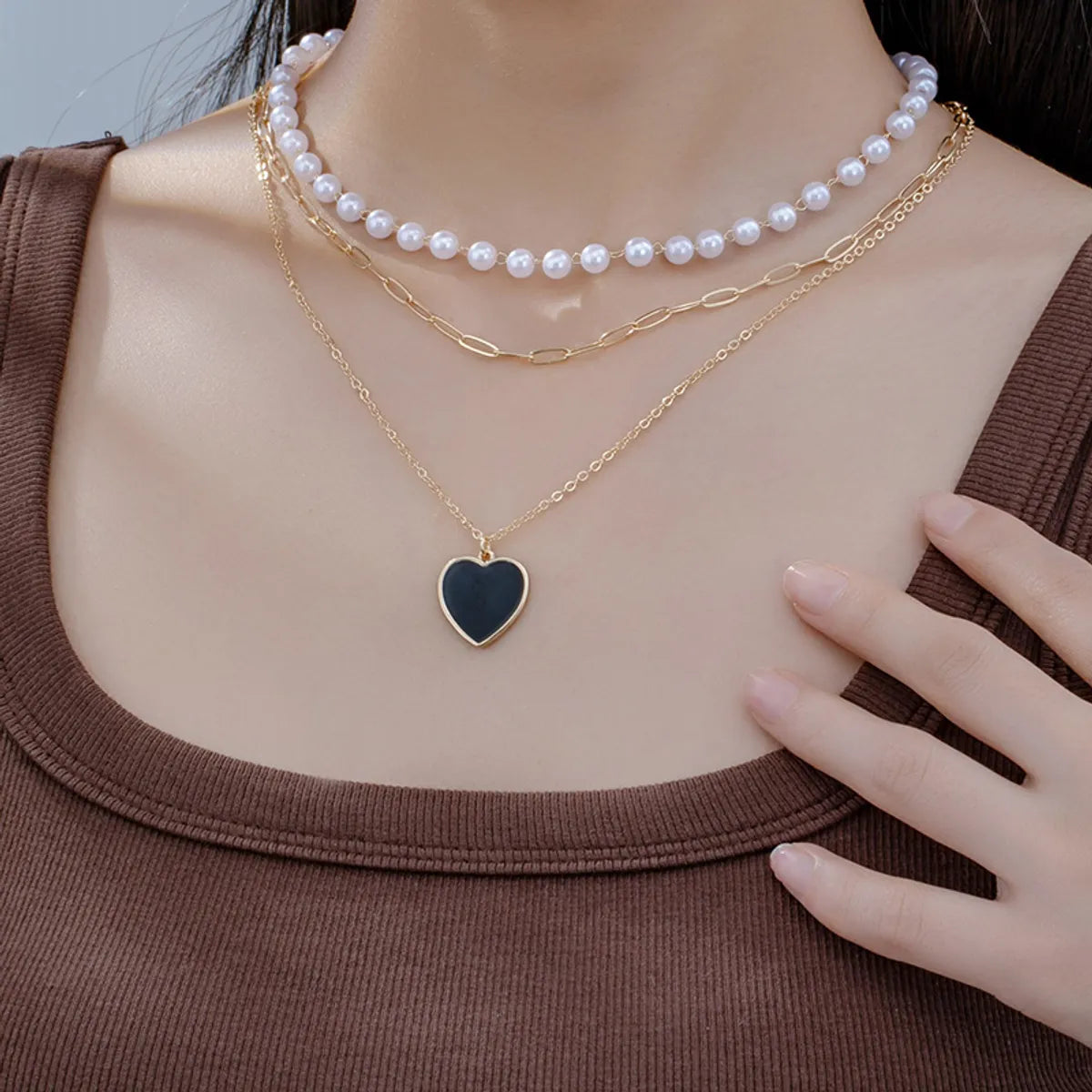 Women’s delicate necklaces-Simple Style Heart Shape Plastic Zinc Alloy Women's Three Layer Necklace